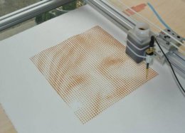 Impressora usa gotas de café para imprimir fotografias