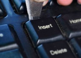Para que serve a tecla Insert do teclado?